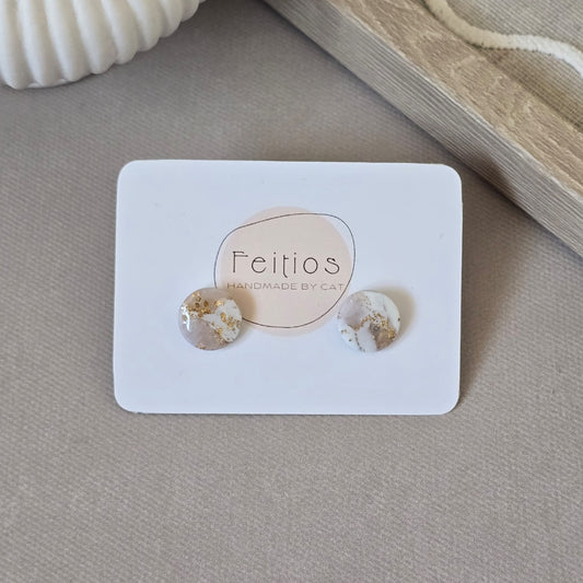 Small white marble studs